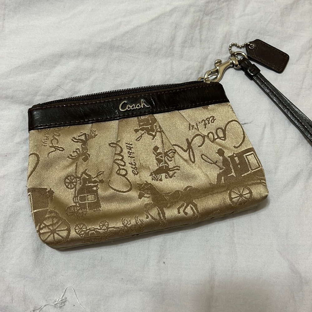 Coach mini wristlet.